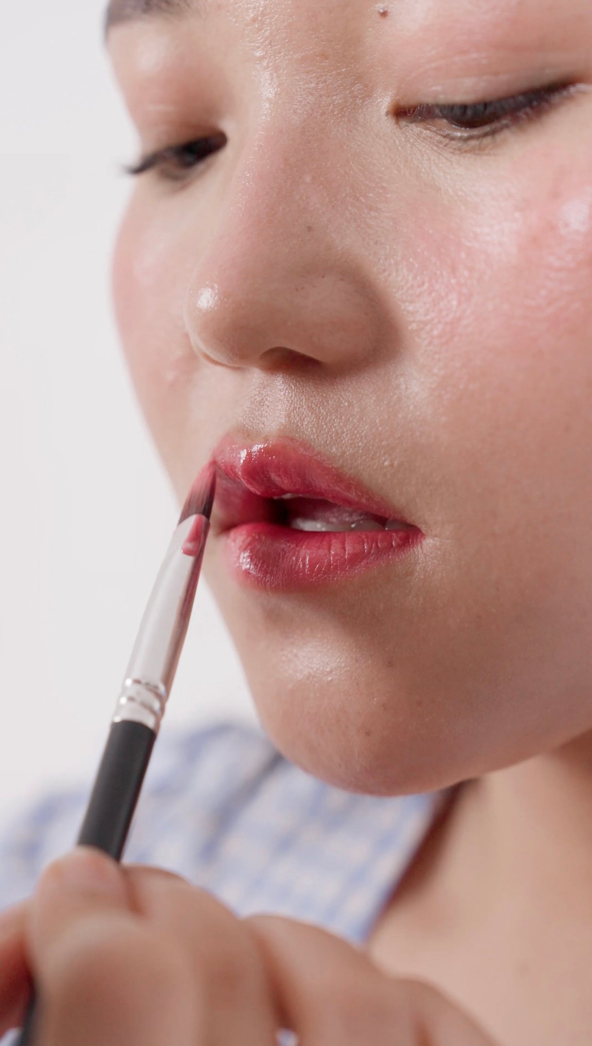 Lip makeup application close-up